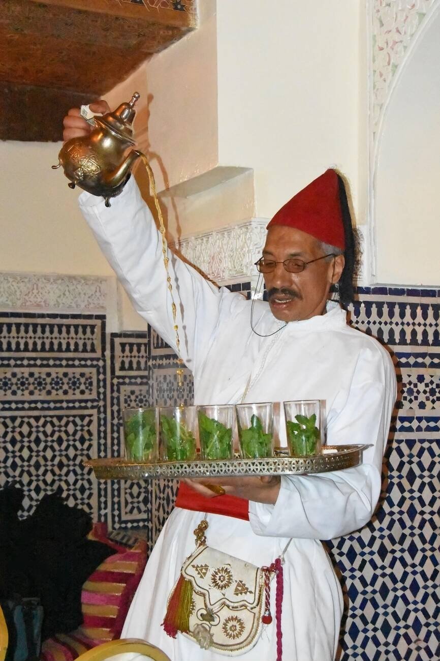 Moroccan man preparing the tea